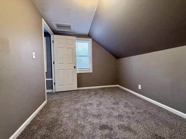 bonus room featuring carpet floors and lofted ceiling