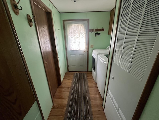 521 Oak Lodge Rd, Waterford, WI 53185 - laundry room with washer and dryer and wood-type flooring