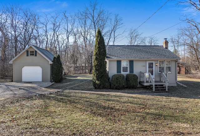 view of home's exterior with an outbuilding, a garage, and a lawn