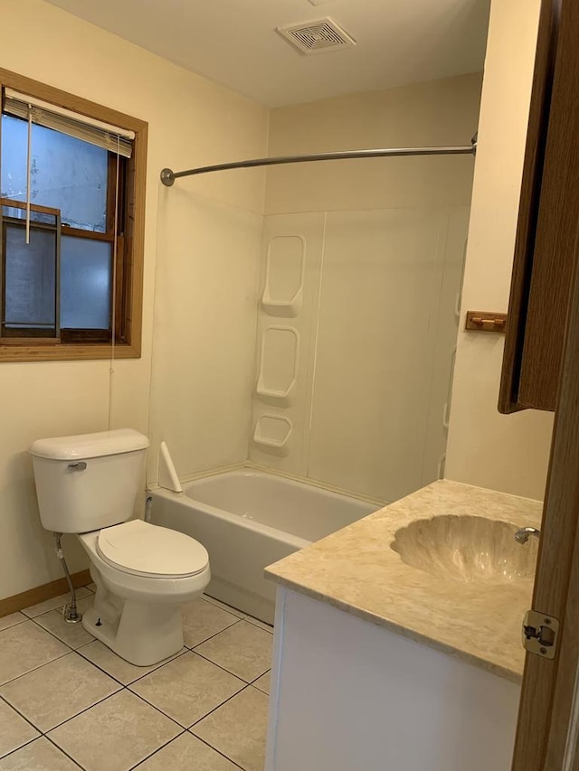 full bathroom featuring tile patterned floors, washtub / shower combination, vanity, and toilet