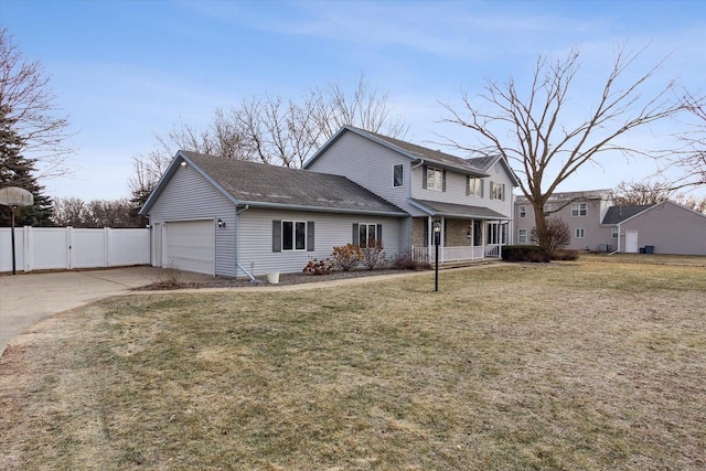 exterior space with a front lawn, a porch, and a garage