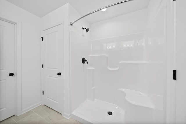 bathroom featuring a shower