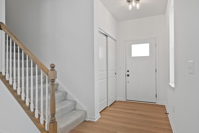 foyer entrance featuring light hardwood / wood-style flooring