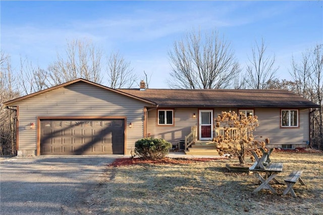 ranch-style house with a garage