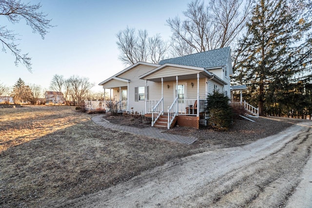 view of front of property featuring covered porch