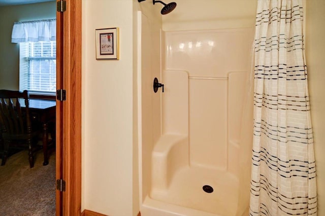 bathroom featuring walk in shower