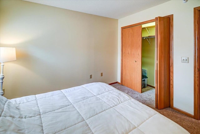 carpeted bedroom with a closet