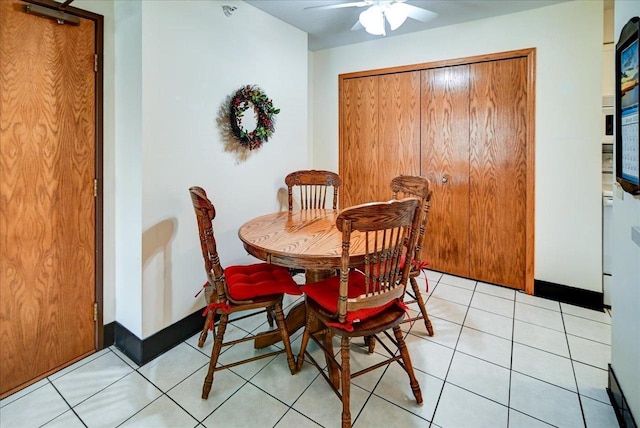 dining space with ceiling fan