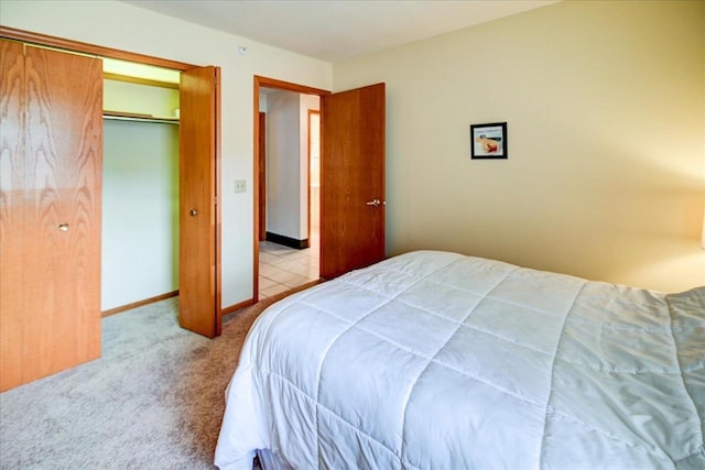 bedroom with light colored carpet