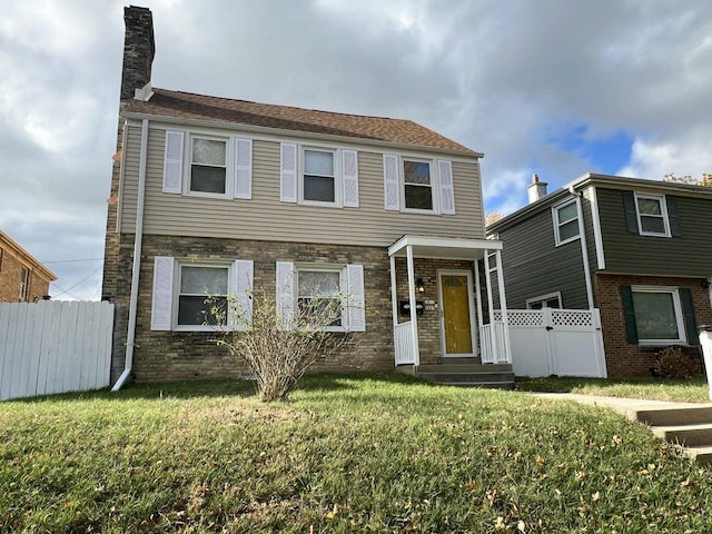 view of front of home featuring a front lawn