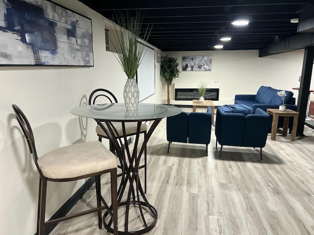 dining area with wood-type flooring