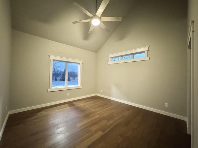 unfurnished room featuring ceiling fan, high vaulted ceiling, and dark wood-type flooring