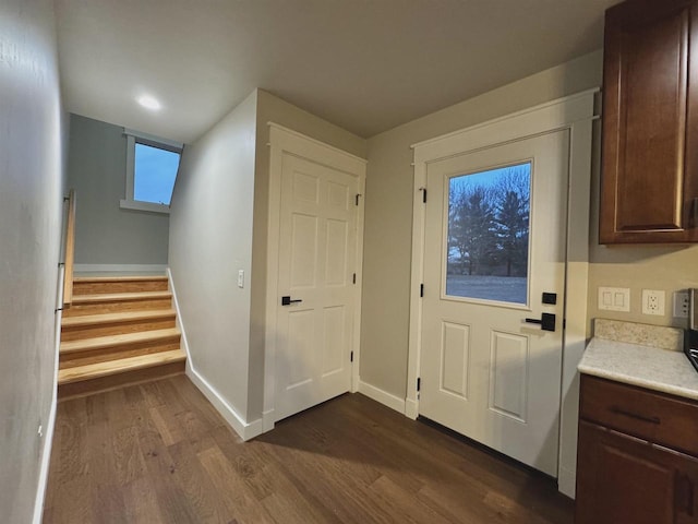 doorway to outside with dark hardwood / wood-style flooring