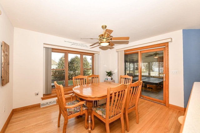 dining room featuring light wood-type flooring