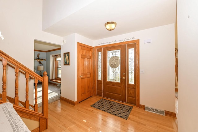 entrance foyer with light wood-type flooring