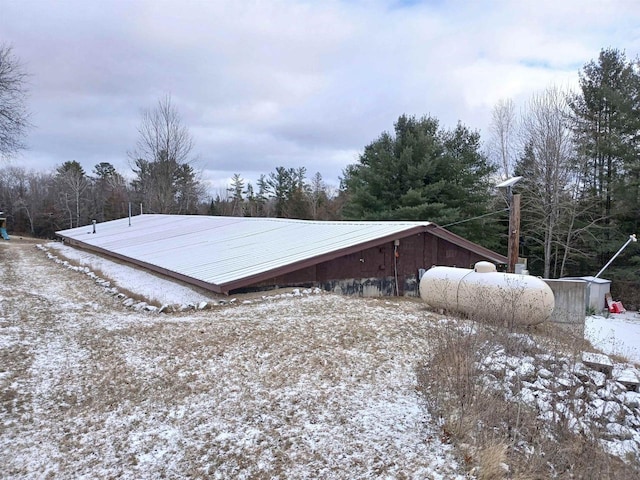 view of yard covered in snow