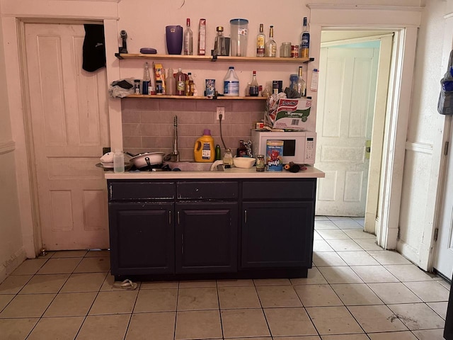 bar with light tile patterned floors