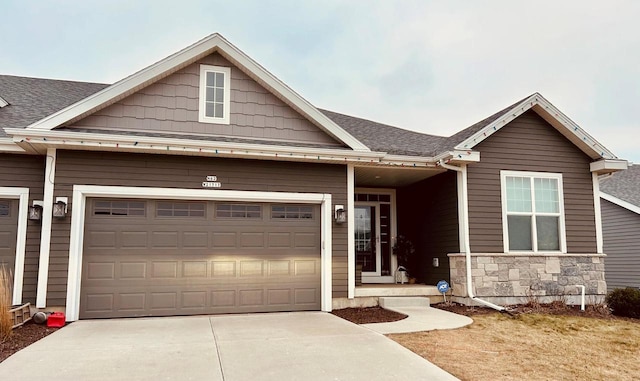 craftsman-style house featuring a garage