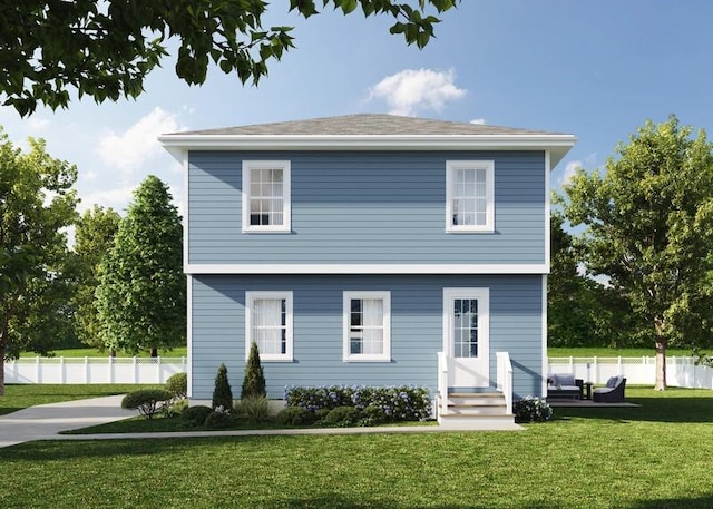 view of front facade featuring a front yard