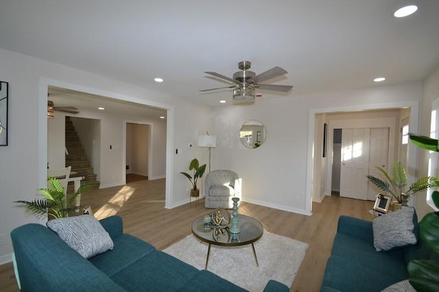 living room with light hardwood / wood-style flooring