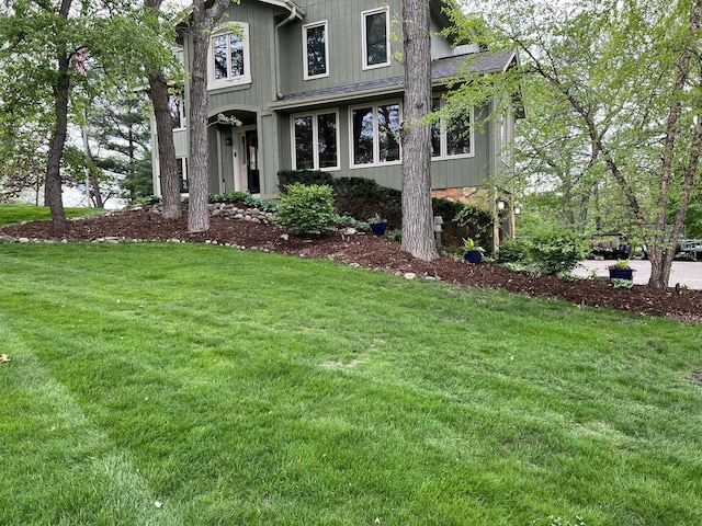 exterior space featuring a front lawn