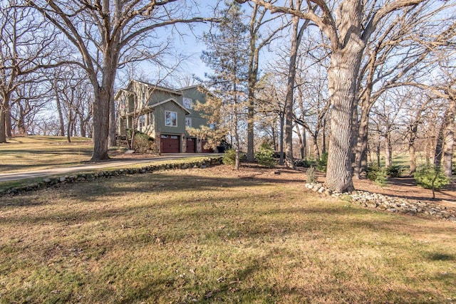 view of yard with a garage