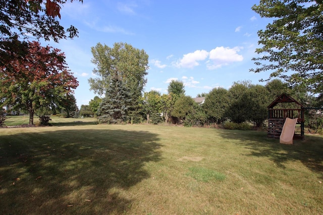 view of yard with a playground