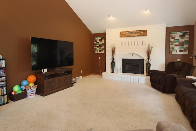 living room with a fireplace, carpet, and vaulted ceiling