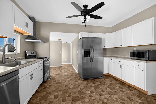 kitchen featuring white cabinets, appliances with stainless steel finishes, ceiling fan, and sink