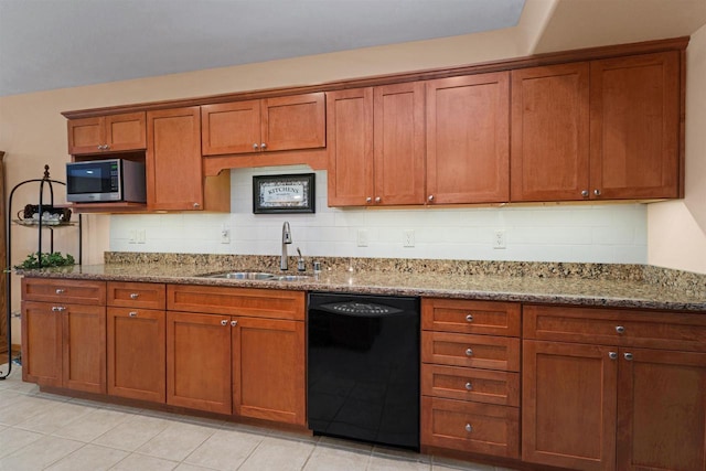 kitchen featuring black dishwasher, decorative backsplash, sink, stone countertops, and light tile patterned floors