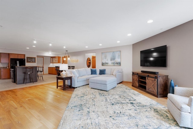 living room featuring light wood-type flooring