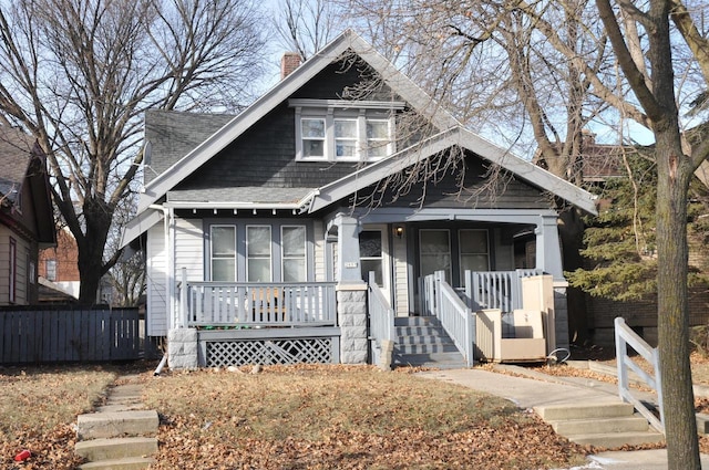 view of front of property featuring covered porch