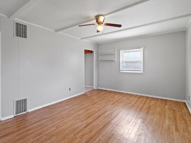 empty room with ceiling fan, ornamental molding, and light wood-type flooring