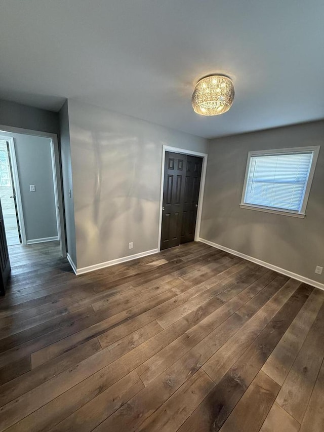 interior space with dark wood-type flooring