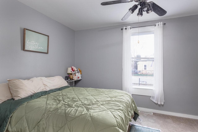 carpeted bedroom featuring ceiling fan