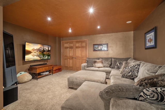 carpeted living room with recessed lighting