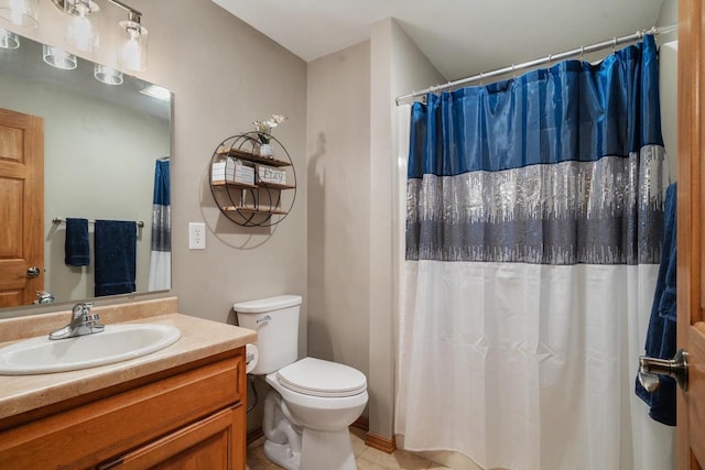 bathroom featuring tile patterned floors, curtained shower, toilet, and vanity