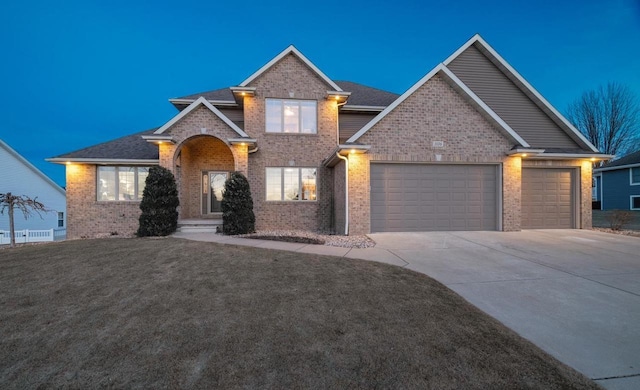 view of front of property featuring a garage