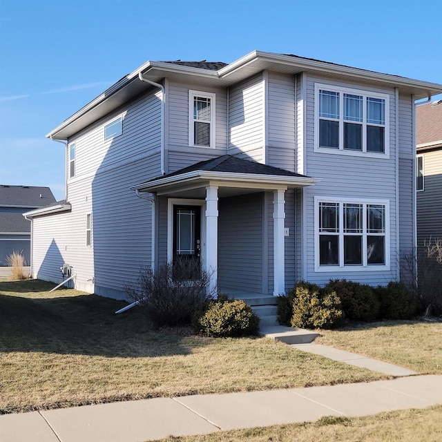 view of front of property with a front yard