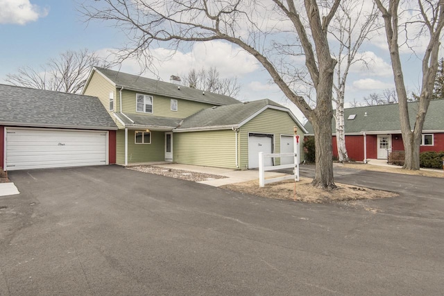 view of front property with a garage