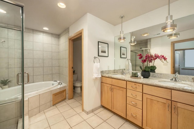 full bathroom featuring tile patterned flooring, vanity, toilet, and plus walk in shower