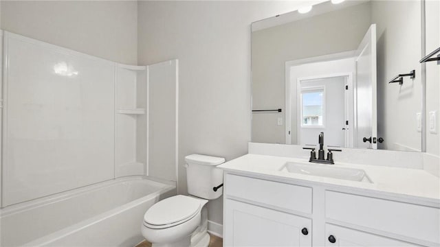 full bathroom with shower / tub combination, vanity, and toilet