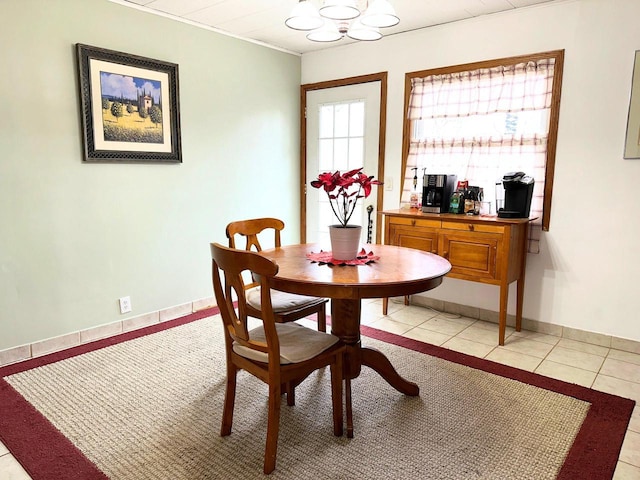 dining area featuring light tile patterned floors