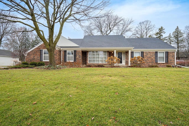 single story home with a front yard