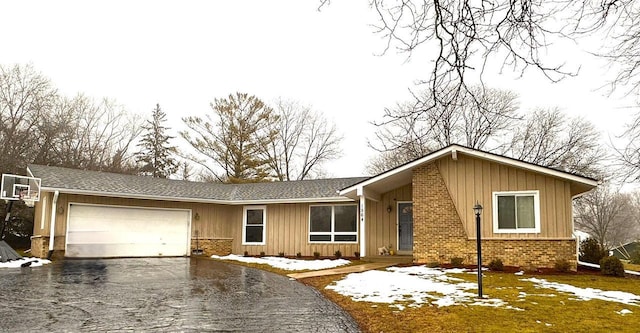 ranch-style home with a garage