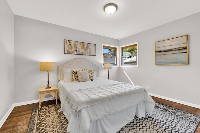 bedroom with wood-type flooring