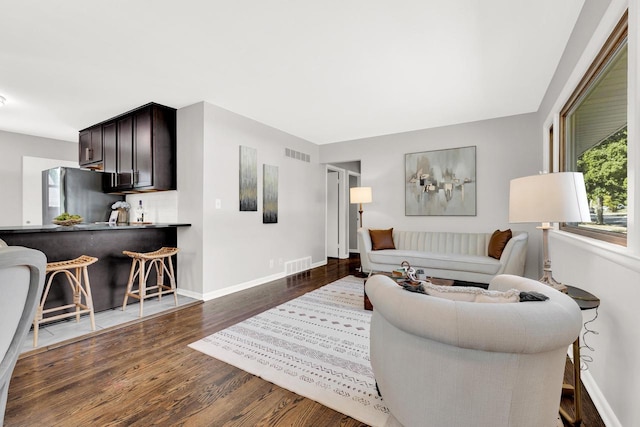 living room with dark wood-type flooring