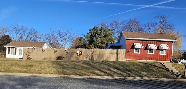 view of home's exterior featuring a yard