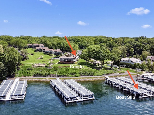 birds eye view of property featuring a water view