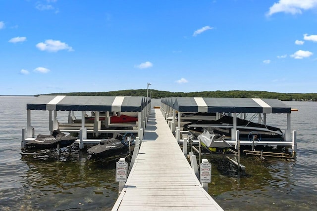 view of dock featuring a water view